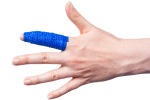 Cohesive Bandage Retaining a Dressing on a Finger